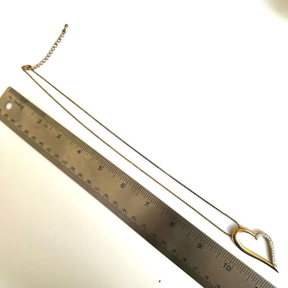 Gold tone open heart pendant necklace